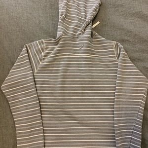 Grey and white stripped Columbia hoodie.
